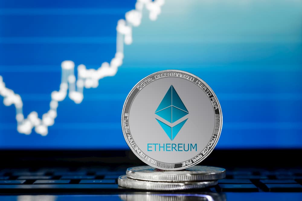 In this photo Ehtereum coin and a price chart.