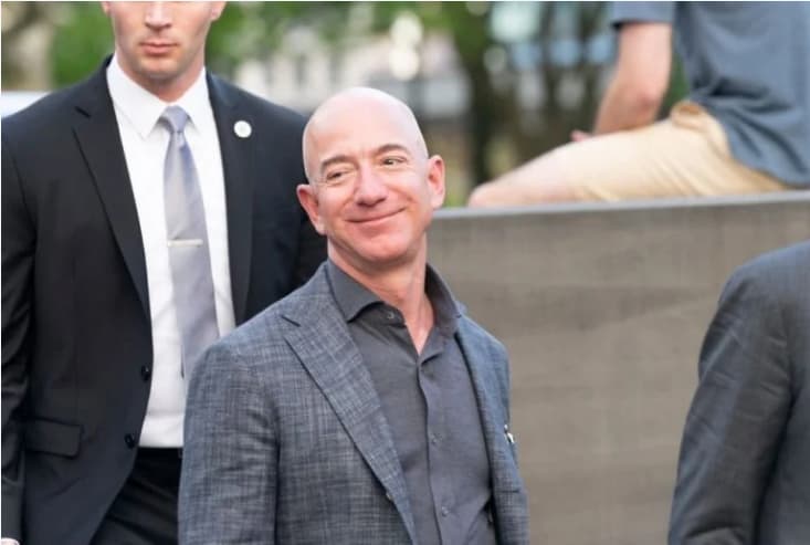 How much money does Jeff Bezos make a second?